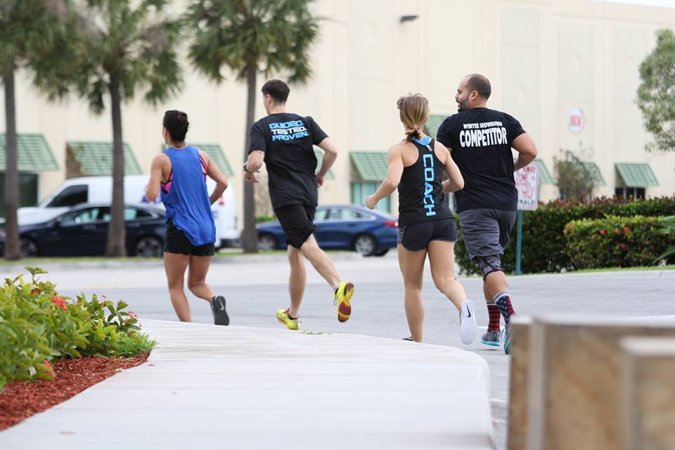 A CrossFit gym in Deerfield Beach, FL: Athletes running outdoors