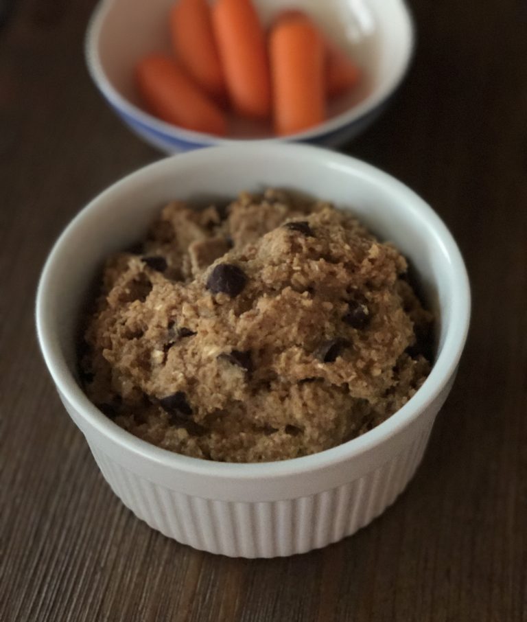 Ramekin with Healthy Cookie Dough Dip & Bowl of Carrots in Background | Healthystepsnutrition.com