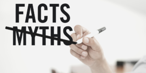 Facts vs Myths person writing on whiteoboard for nutrition myths