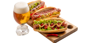 beer and hot dogs on a table